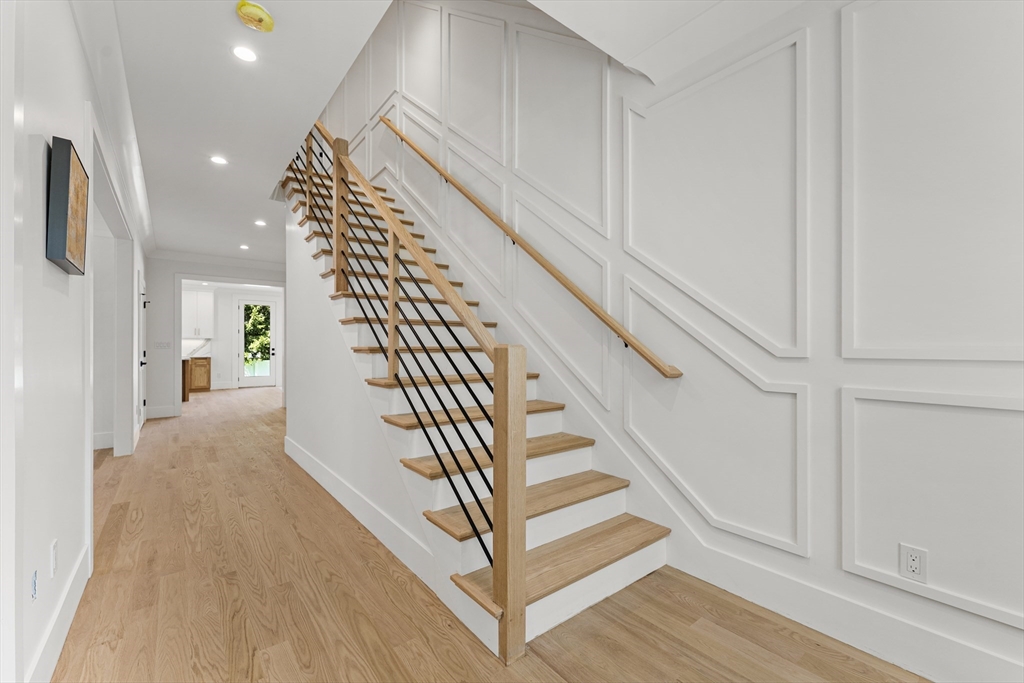 59 Henderson Street Needham, MA 02492 - Photo 14 of 32 a view of entryway and hall with wooden floor