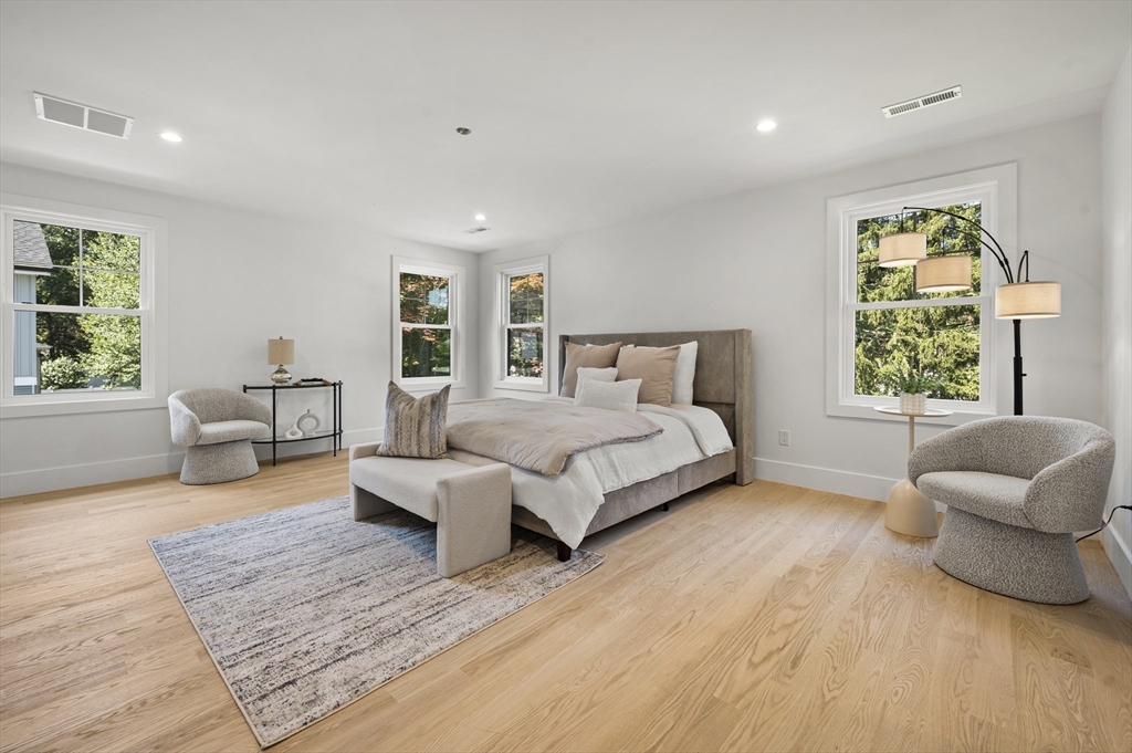 59 Henderson Street Needham, MA 02492 - Photo 15 of 32 a bedroom with furniture and a large window