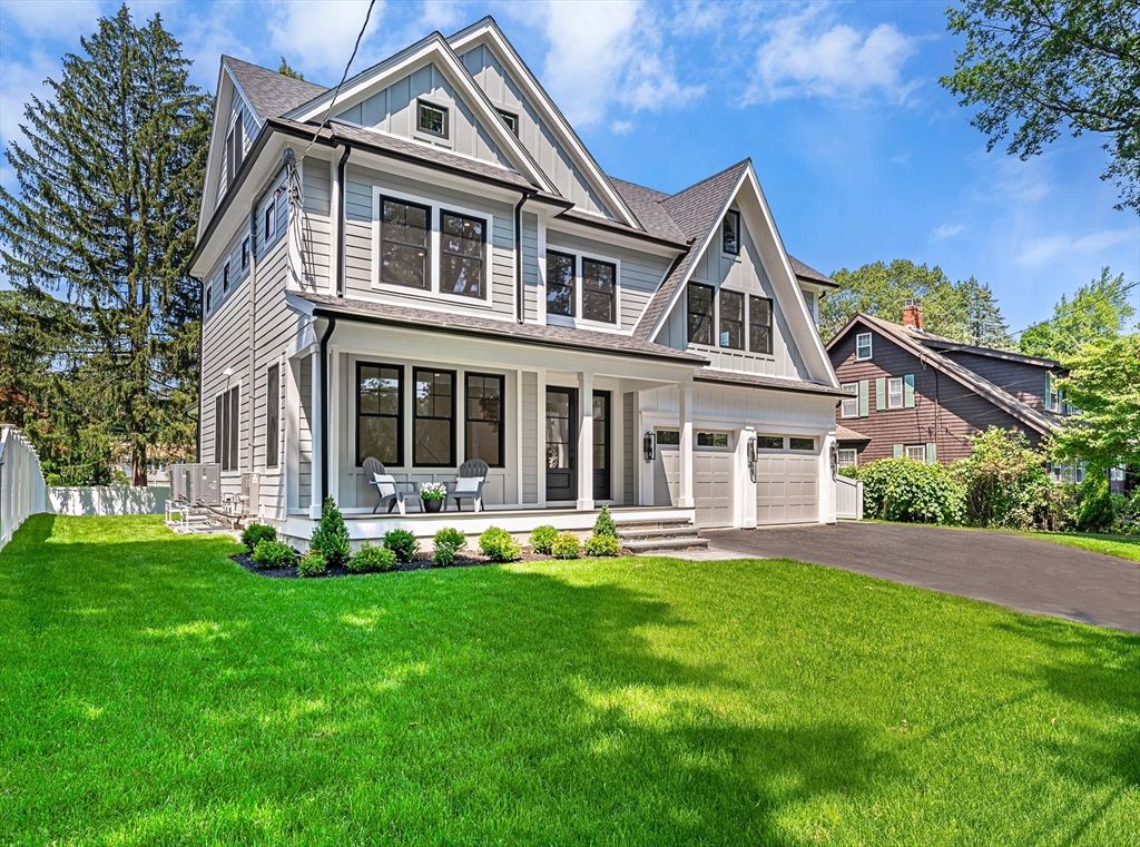59 Henderson Street Needham, MA 02492 - Photo 2 of 32 front view of a house with a yard