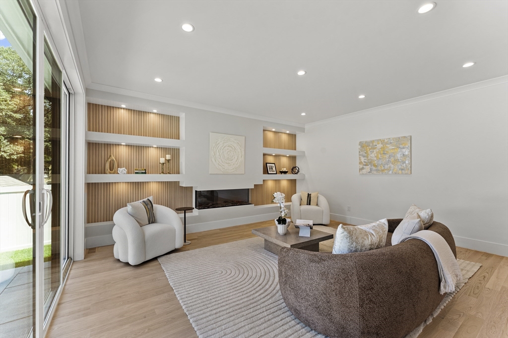 59 Henderson Street Needham, MA 02492 - Photo 5 of 32 a living room with furniture and a large window