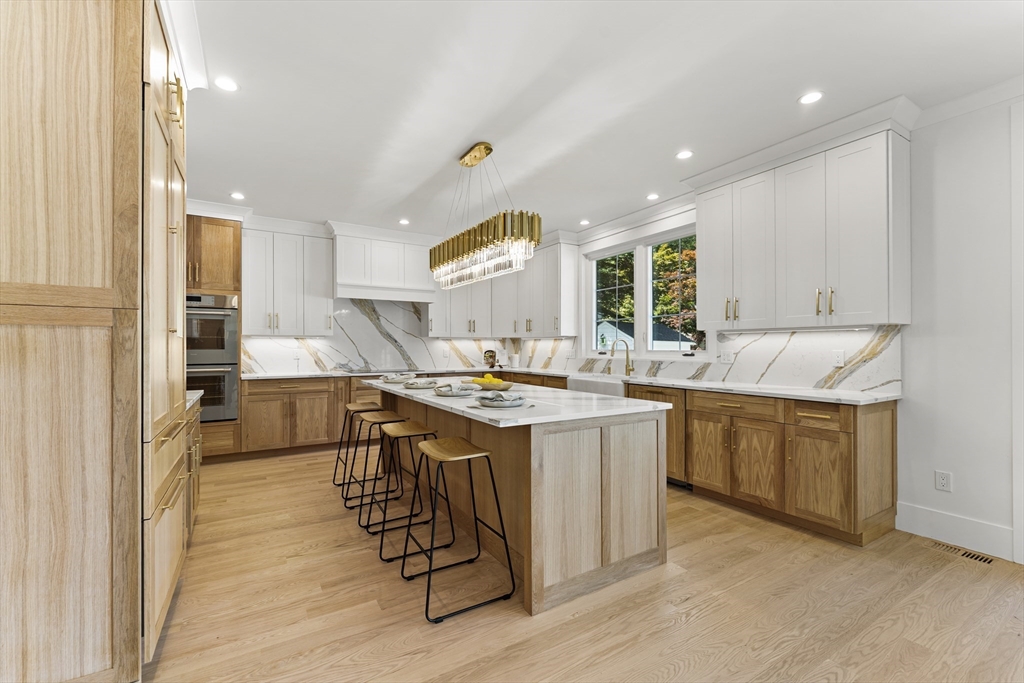 59 Henderson Street Needham, MA 02492 - Photo 8 of 32 a kitchen with sink stove and refrigerator