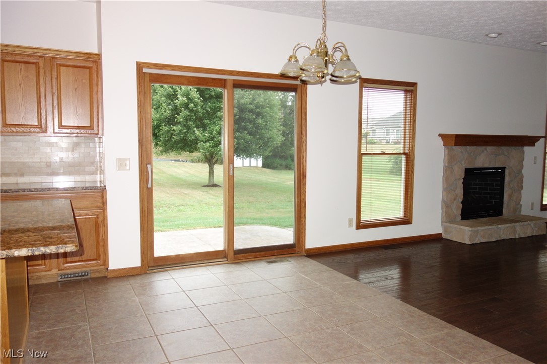 4891 Edson Road Kent, OH 44240 - Photo 9 of 48 Great big Eating area w/ sliders to the back yard