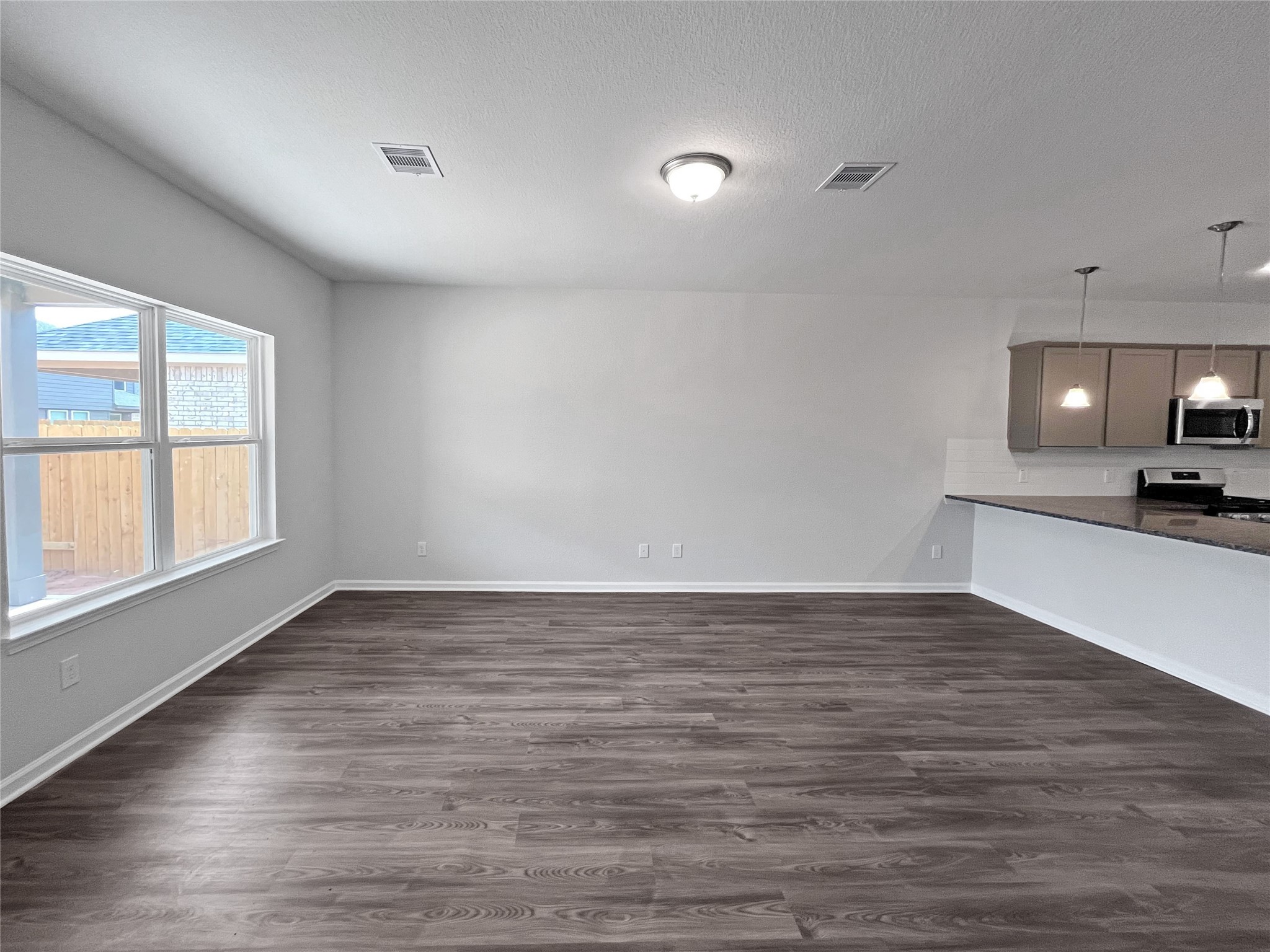 8523 Fly Line Lane Fulshear, TX 77441 - Photo 10 of 23 The Sparrow II- Family Room. Sample image for illustration; upgrades, options, and colors may vary.