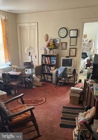 813 Arch Street Norristown, PA 19401 - Photo 16 of 18 a living room with furniture a air conditioner and a window