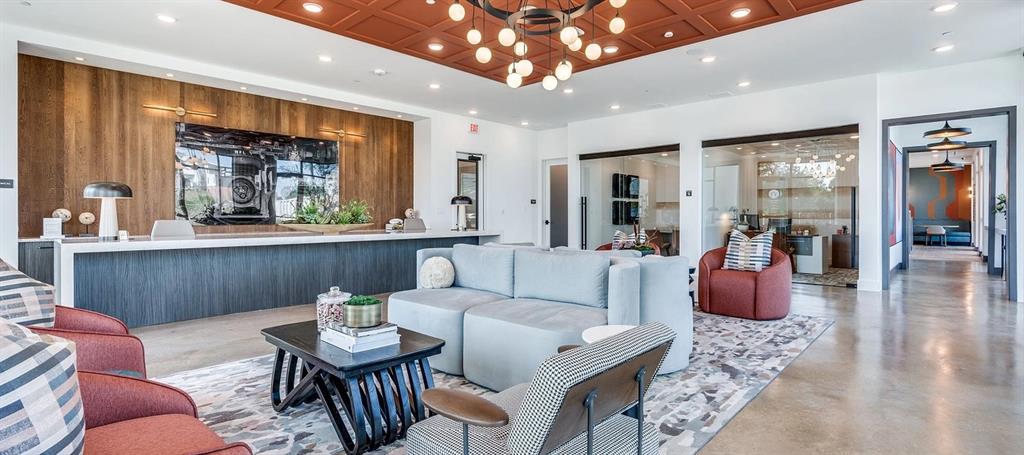 650 East Sycamore Street, Unit 1149 Denton, TX 76205 - Photo 18 of 19 a living room with furniture a window and kitchen view