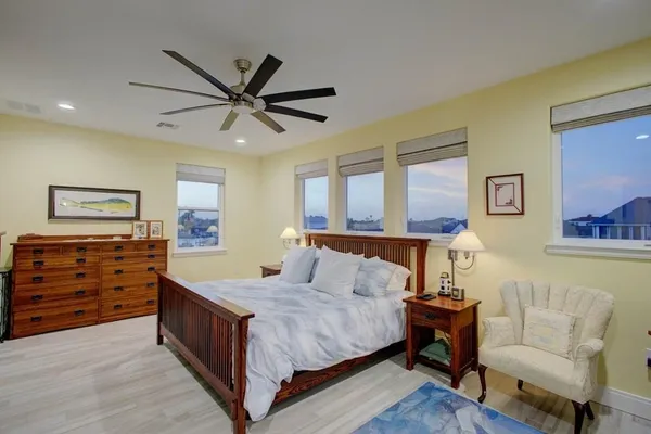 a bed room with a bed and a couch