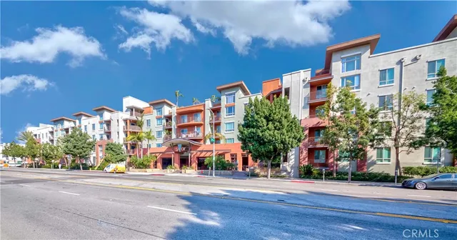a front view of a building with street view