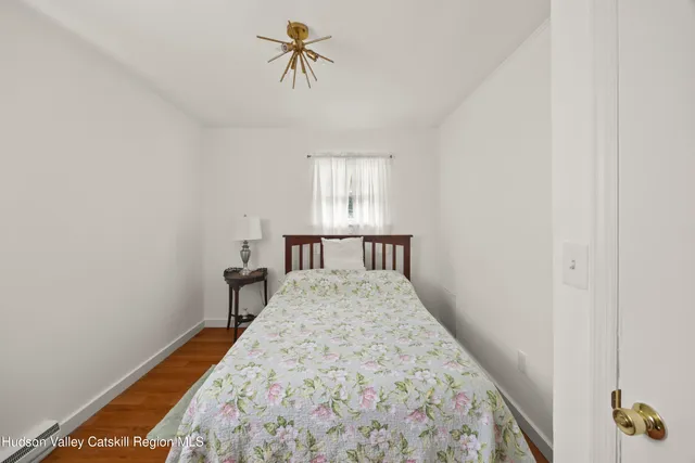 a view of a hallway with a bedroom