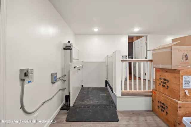 a view of a hallway with windows