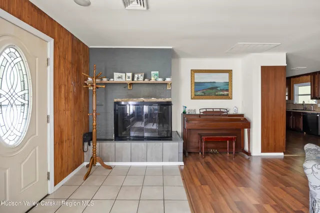 a room with furniture and a fireplace
