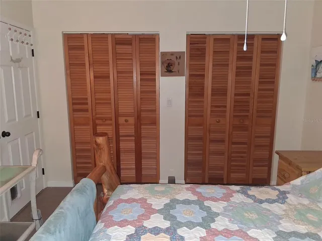 a view of wooden door and entryway