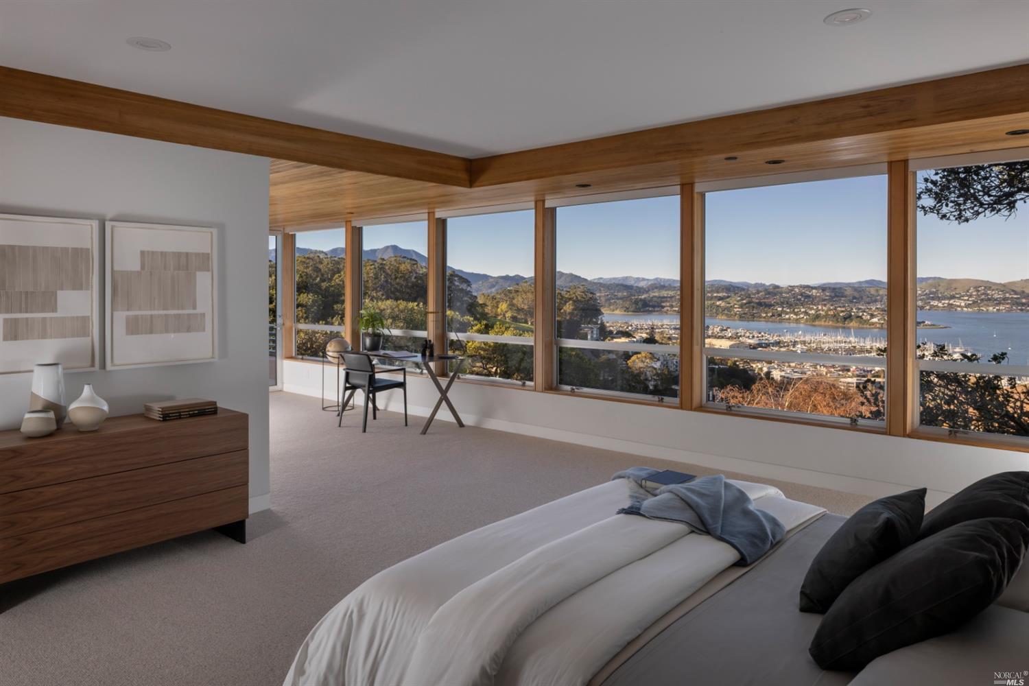 121 Toyon Lane Sausalito, CA 94965 - Photo 15 of 25 a living room with furniture and a floor to ceiling window