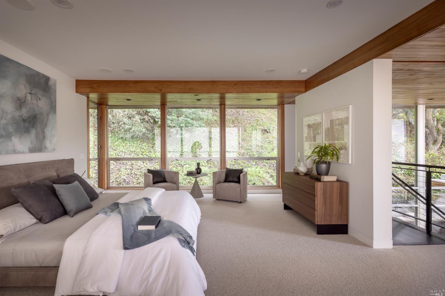 121 Toyon Lane Sausalito, CA 94965 - Photo 16 of 25 a bed room with a bed and a couch