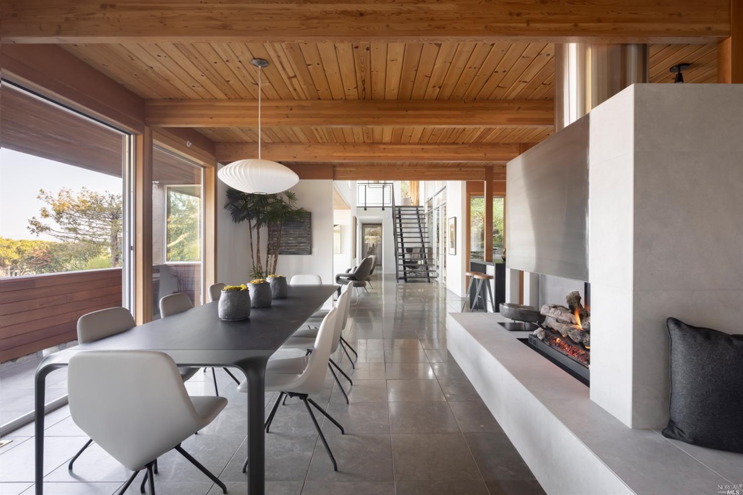 121 Toyon Lane Sausalito, CA 94965 - Photo 4 of 25 a view of a dining room with furniture wooden floor and chandelier