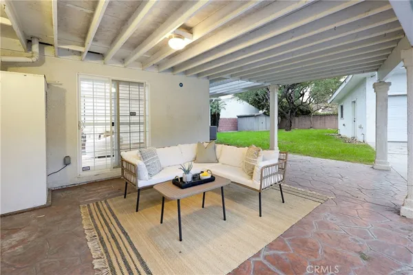 a outdoor living space with furniture and garden