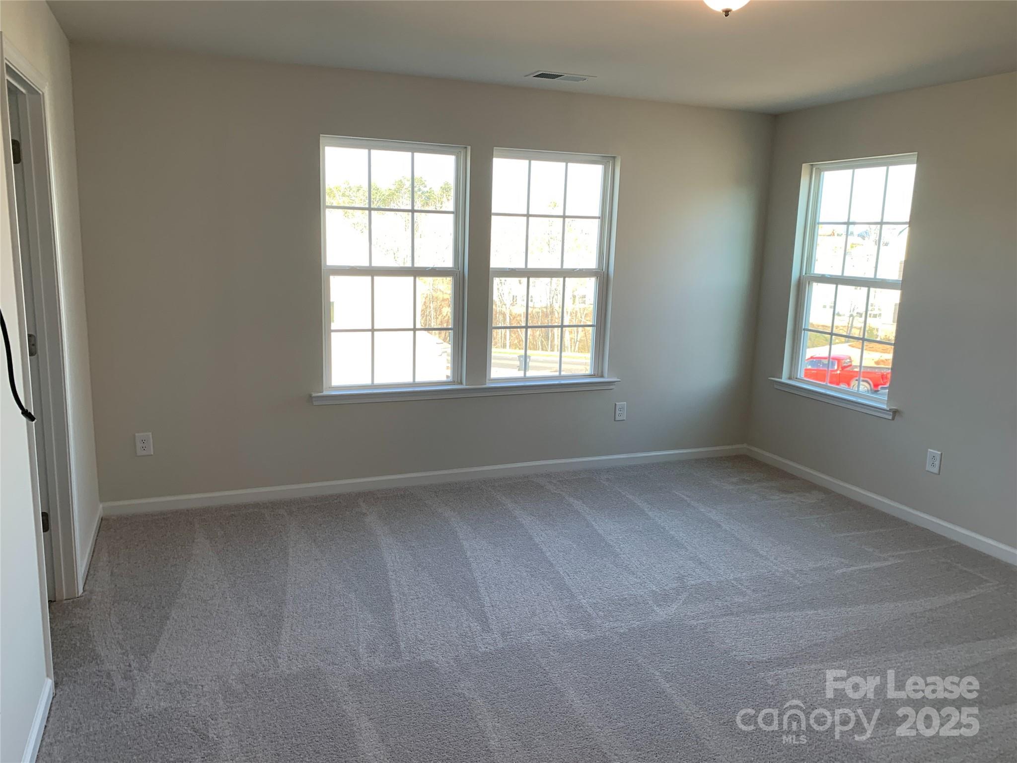 17212 Snug Harbor Drive Charlotte, NC 28278 - Photo 12 of 16 an empty room with a window
