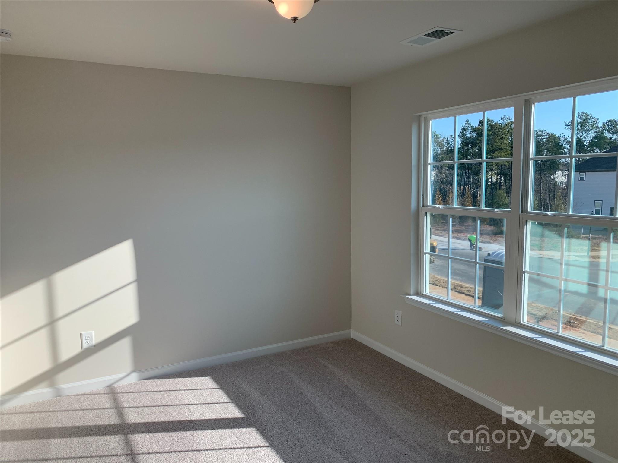 17212 Snug Harbor Drive Charlotte, NC 28278 - Photo 15 of 16 a view of a livingroom with an empty space and window