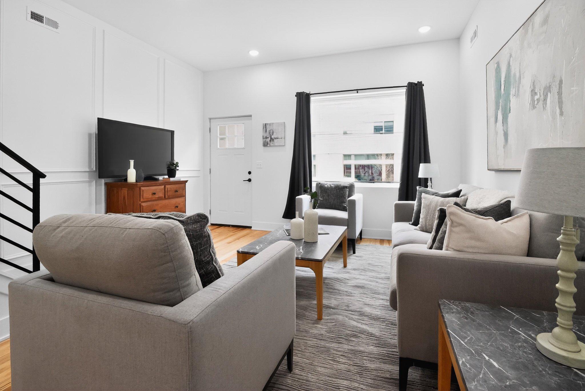 1314 South 46th Street Philadelphia, PA 19143 - Photo 11 of 56 a bedroom with furniture and a flat screen tv
