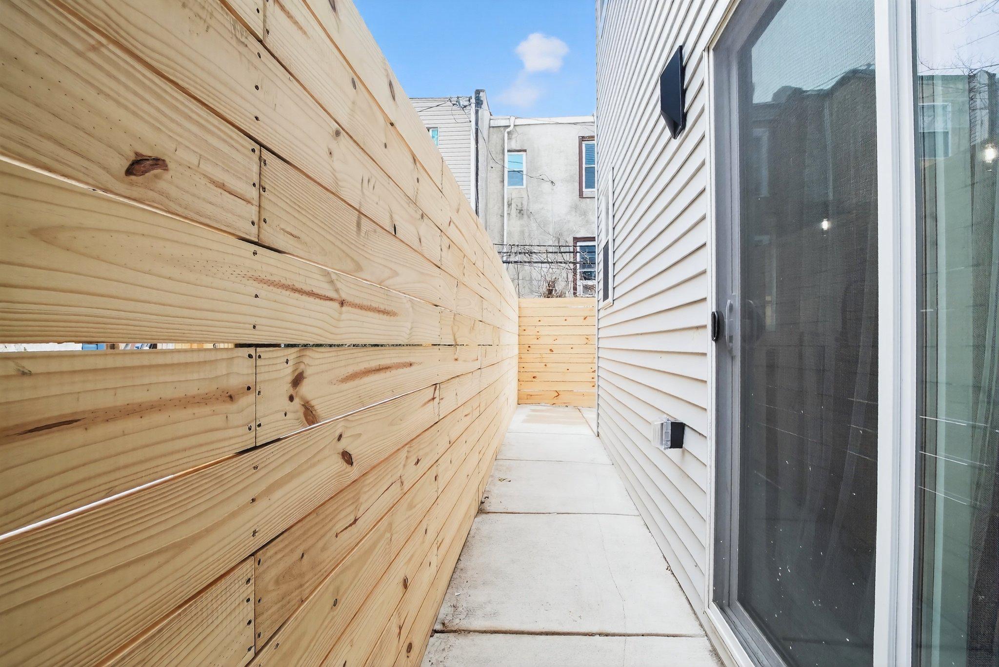 1314 South 46th Street Philadelphia, PA 19143 - Photo 20 of 56 a view of balcony with wooden floor