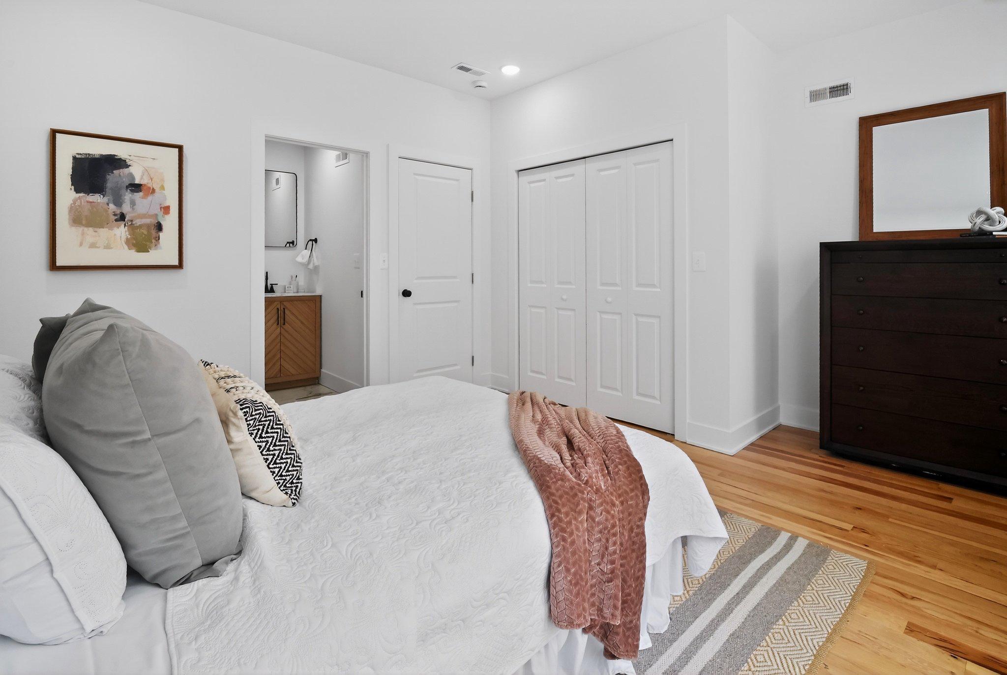 1314 South 46th Street Philadelphia, PA 19143 - Photo 43 of 56 a bed room with a bed and a television