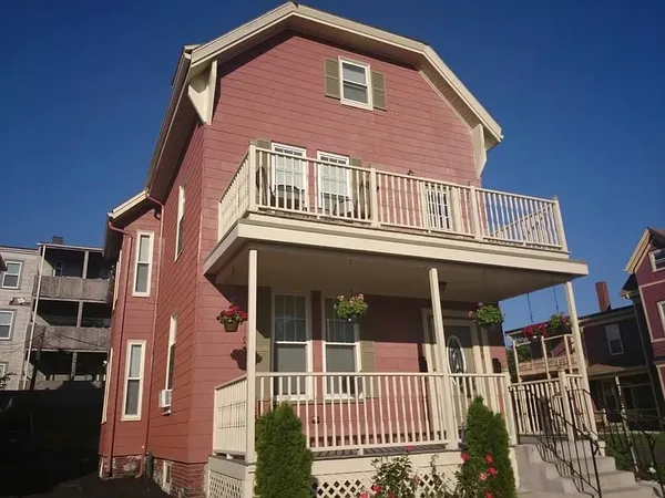 a front view of a house with a porch