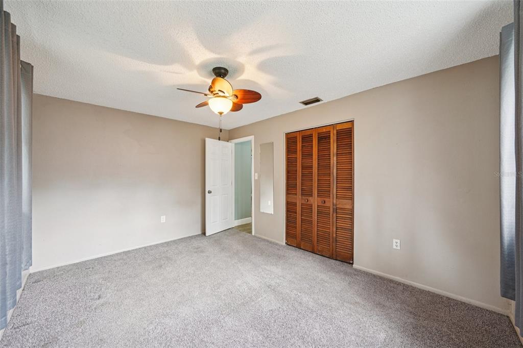 1118 Carlton Road Tarpon Springs, FL 34689 - Photo 36 of 62 a view of an empty room with a window