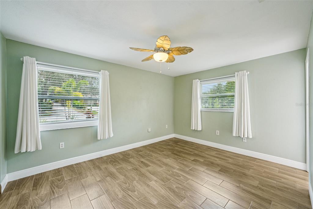 1118 Carlton Road Tarpon Springs, FL 34689 - Photo 4 of 62 a view of an empty room with a window