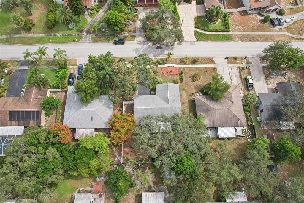 1118 Carlton Road Tarpon Springs, FL 34689 - Photo 54 of 62 an aerial view of a house with outdoor space and lake view