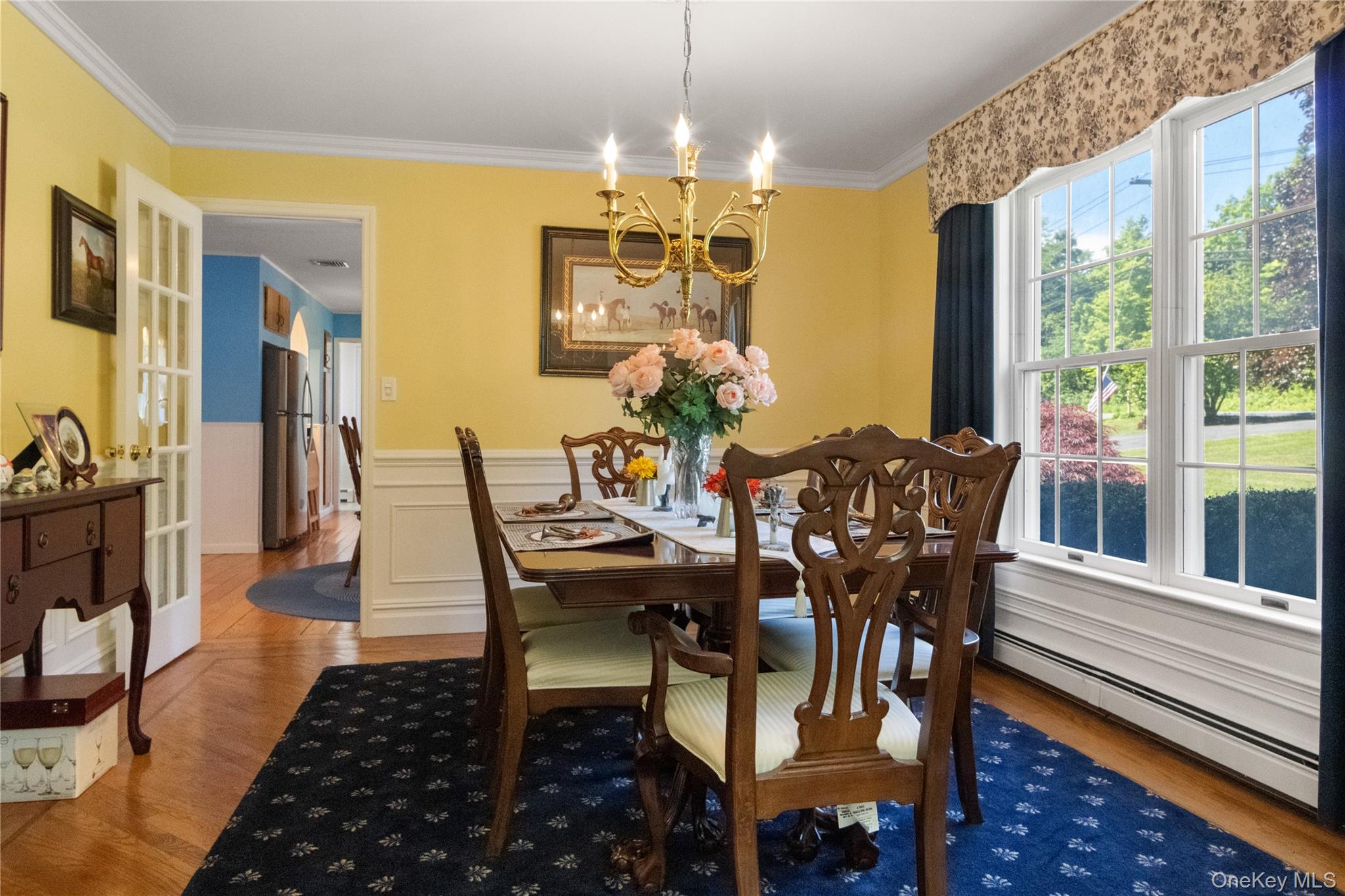214 West Mombasha Road Monroe, NY 10950 - Photo 9 of 43 a view of a dining room with furniture window and wooden floor