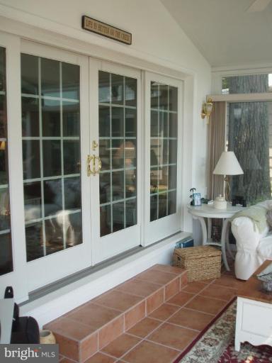 444 Riverside Drive Pasadena, MD 21122 - Photo 13 of 27 French doors lead to Sunroom!