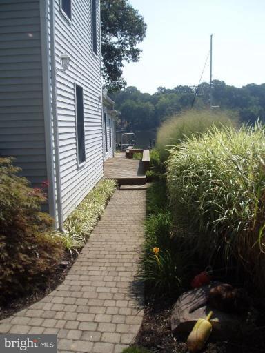 444 Riverside Drive Pasadena, MD 21122 - Photo 26 of 27 Side walk and Landscaping