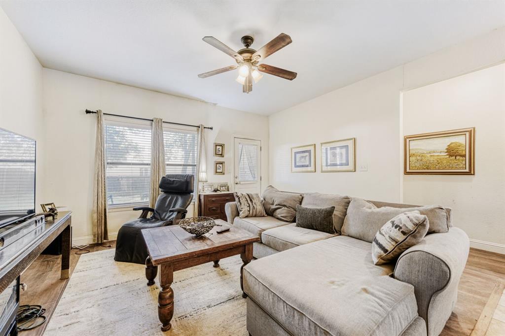 6525 Greenway Road Fort Worth, TX 76116 - Photo 3 of 29 a living room with furniture and a window
