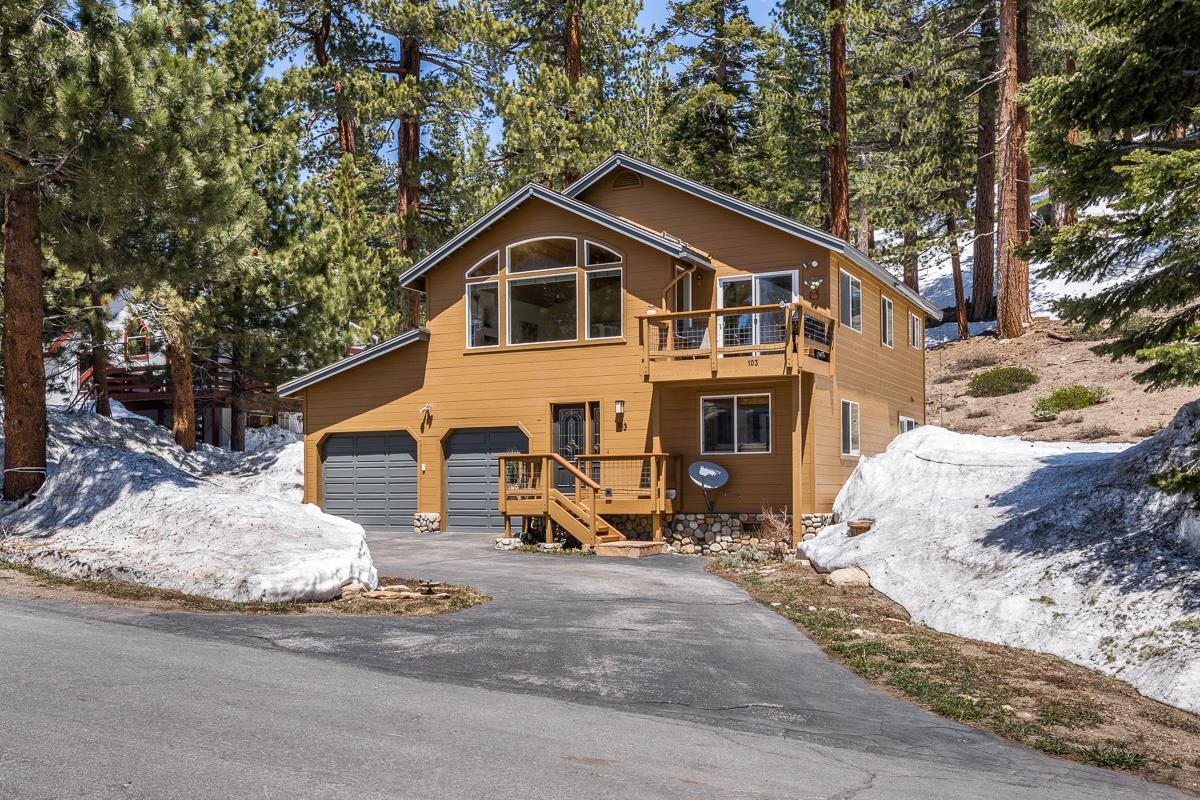 103 Holiday Way Mammoth Lakes, CA 93546 - Photo 2 of 40 a view of a house with a yard