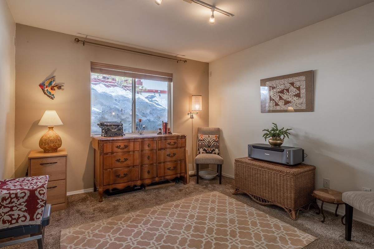 103 Holiday Way Mammoth Lakes, CA 93546 - Photo 29 of 40 a bedroom with furniture and a window