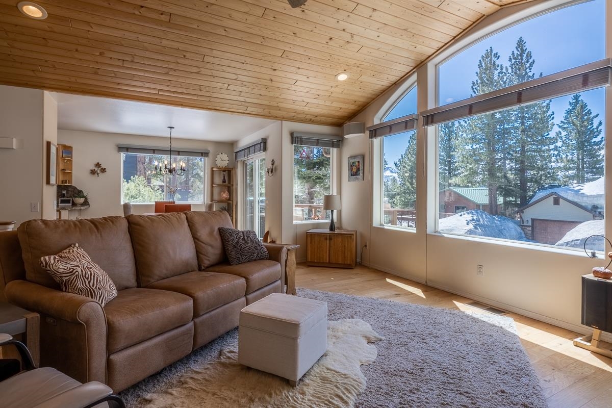 103 Holiday Way Mammoth Lakes, CA 93546 - Photo 7 of 40 a living room with furniture and a large window