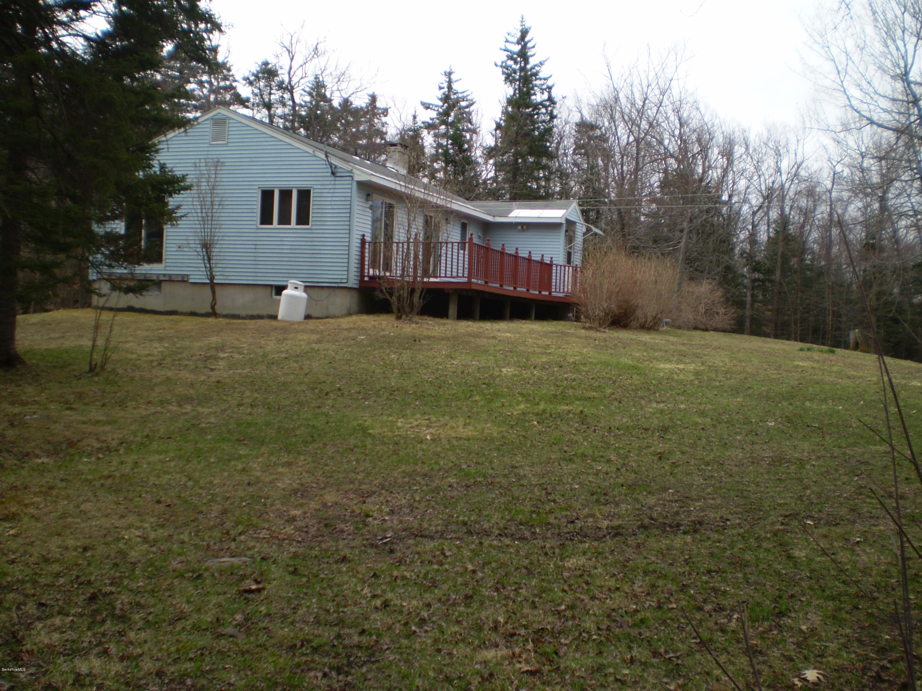 45 N Road Peru, MA 01235 - Photo 6 of 68 a front view of a house with garden