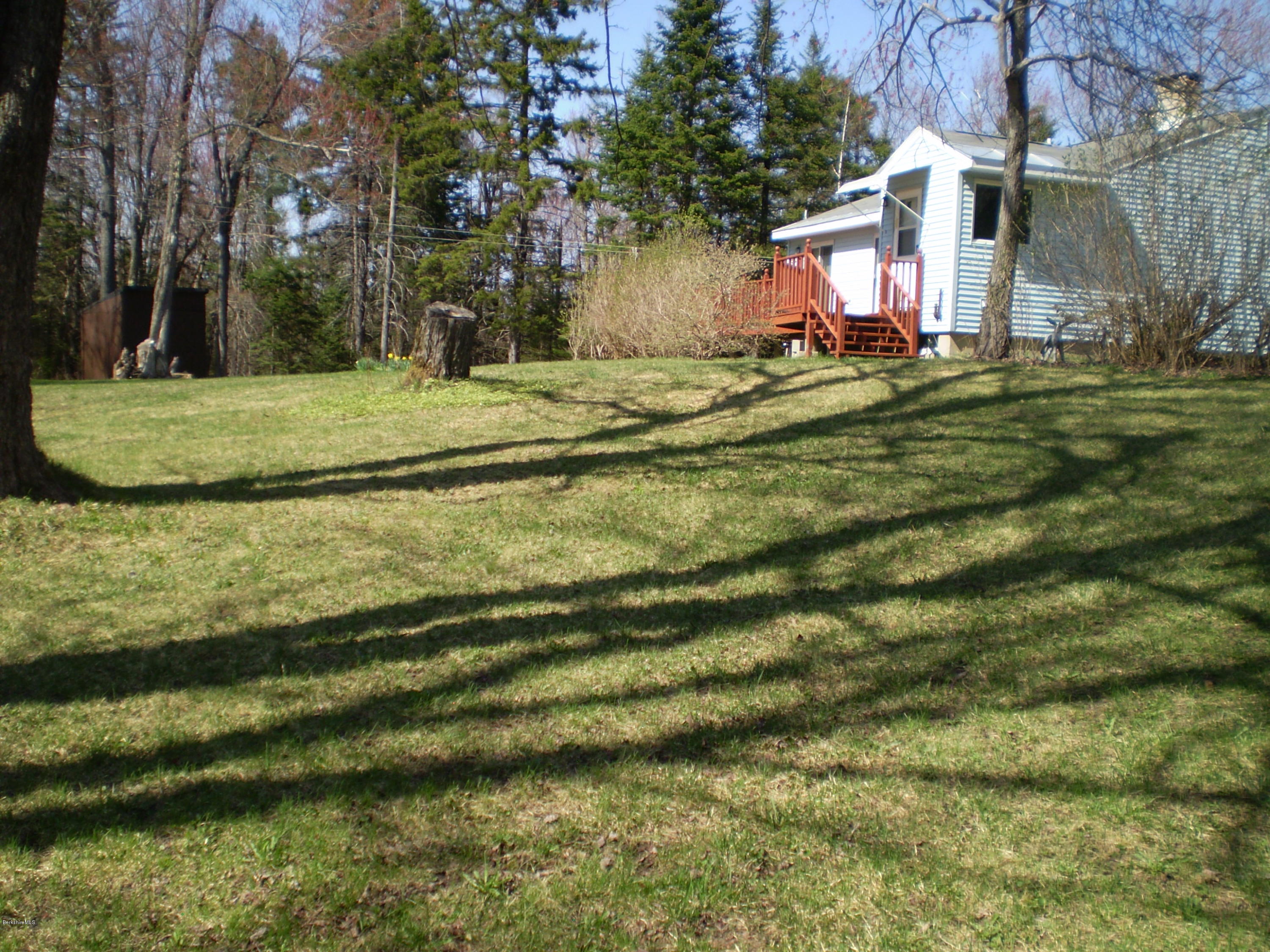 45 N Road Peru, MA 01235 - Photo 64 of 68 a backyard of a house with a yard and outdoor seating