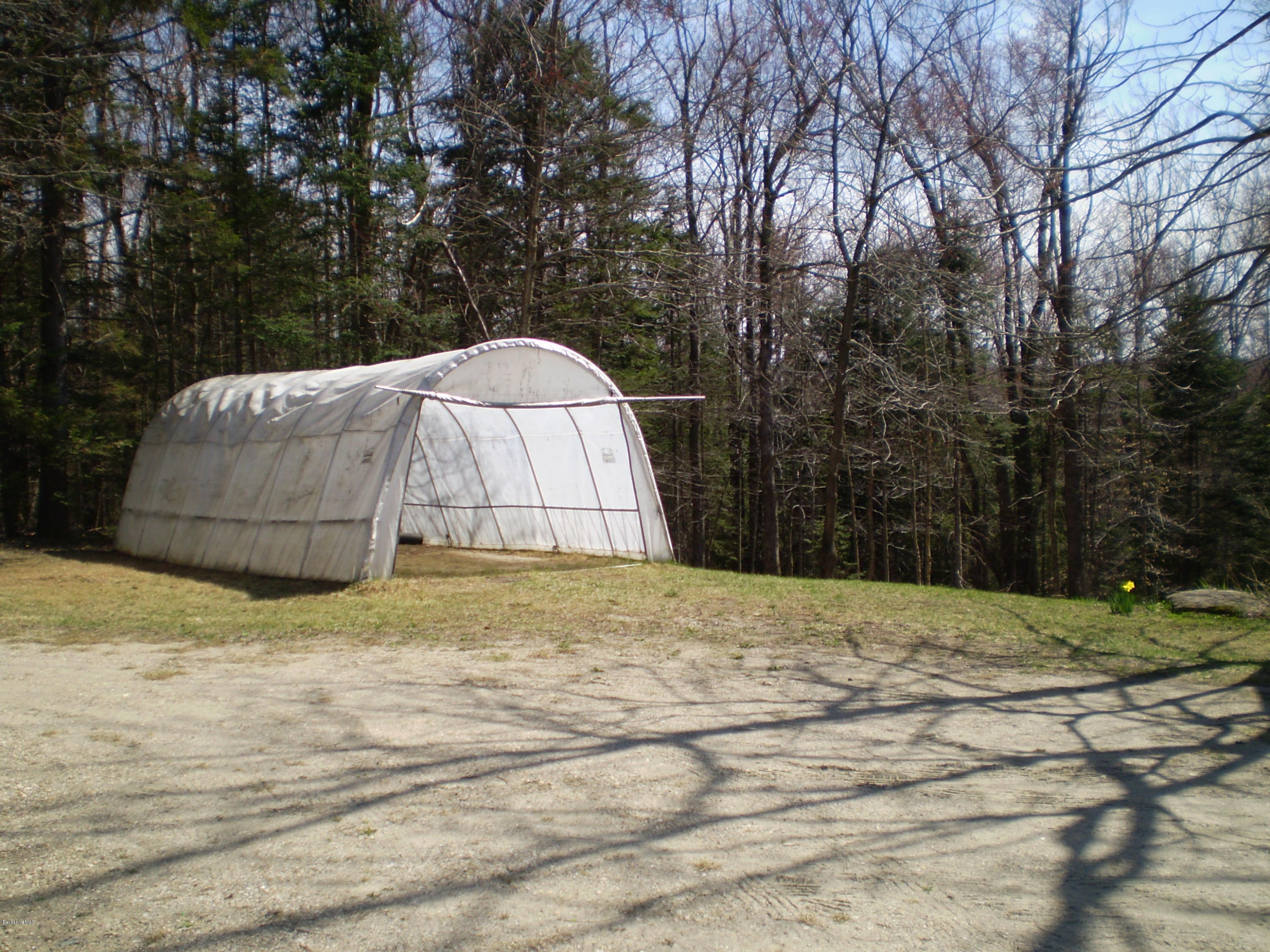 45 N Road Peru, MA 01235 - Photo 66 of 68 a house with trees in the background