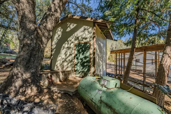a view of backyard with green space