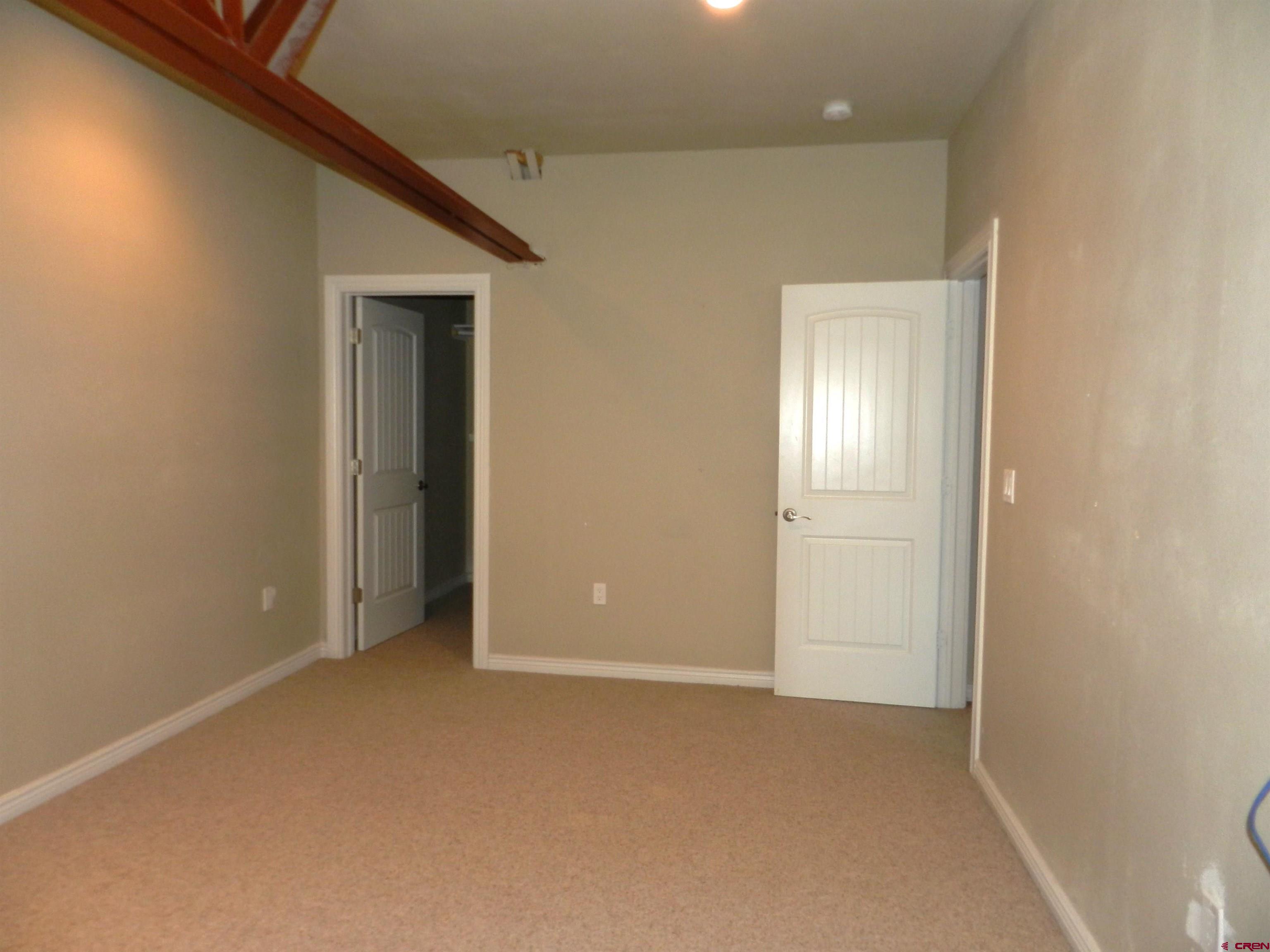 2520 North River Road Olathe, CO 81425 - Photo 31 of 35 an empty room with windows