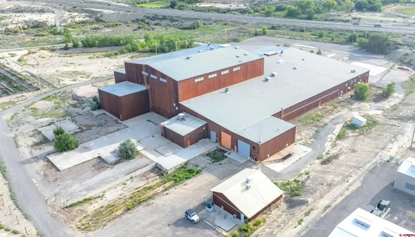 an aerial view of residential house with outdoor space