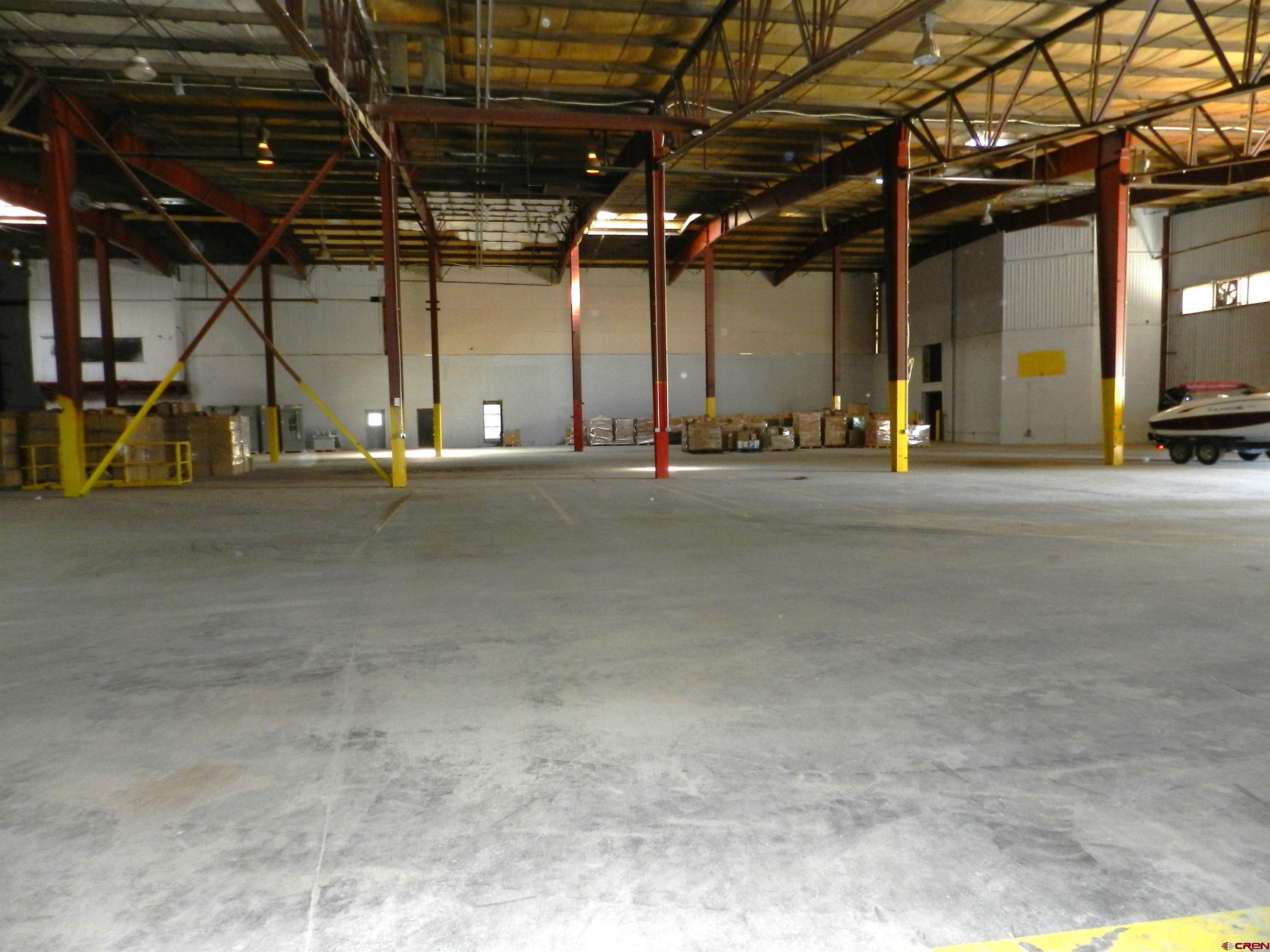 2520 North River Road Olathe, CO 81425 - Photo 7 of 35 a view of an empty room with wooden walls