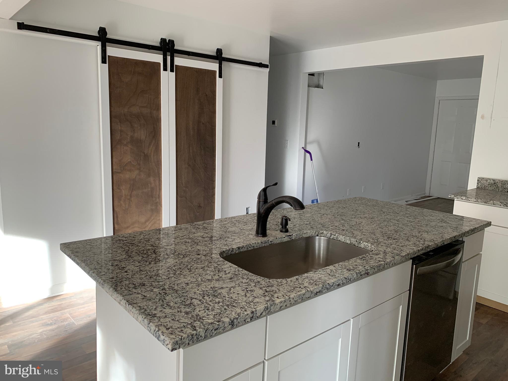 7164 Laurel Grove Road Preston, MD 21655 - Photo 11 of 28 Marble counters; Island with sink and dishwasher