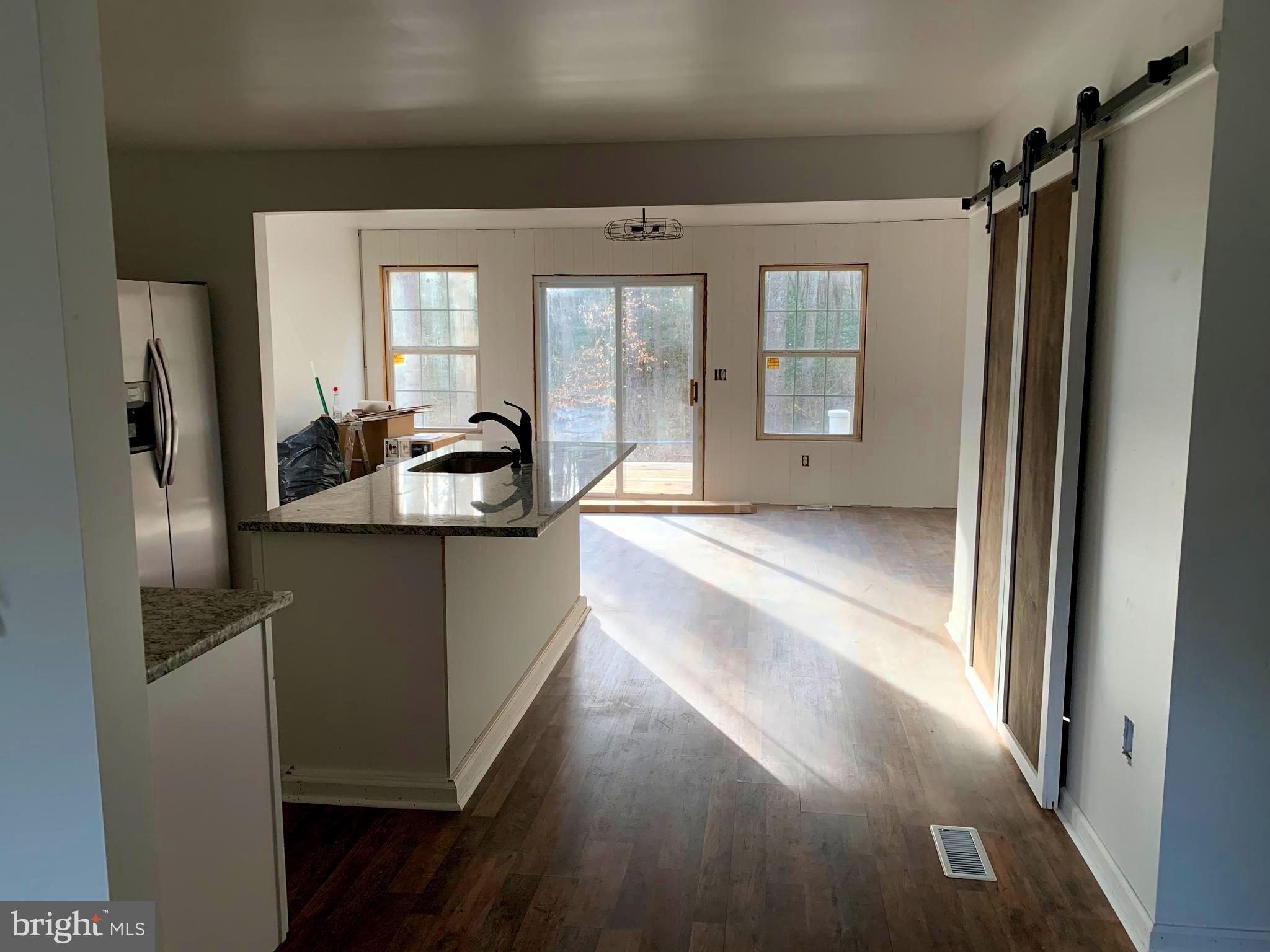 7164 Laurel Grove Road Preston, MD 21655 - Photo 13 of 28 Sliding glass door that leads to rear deck