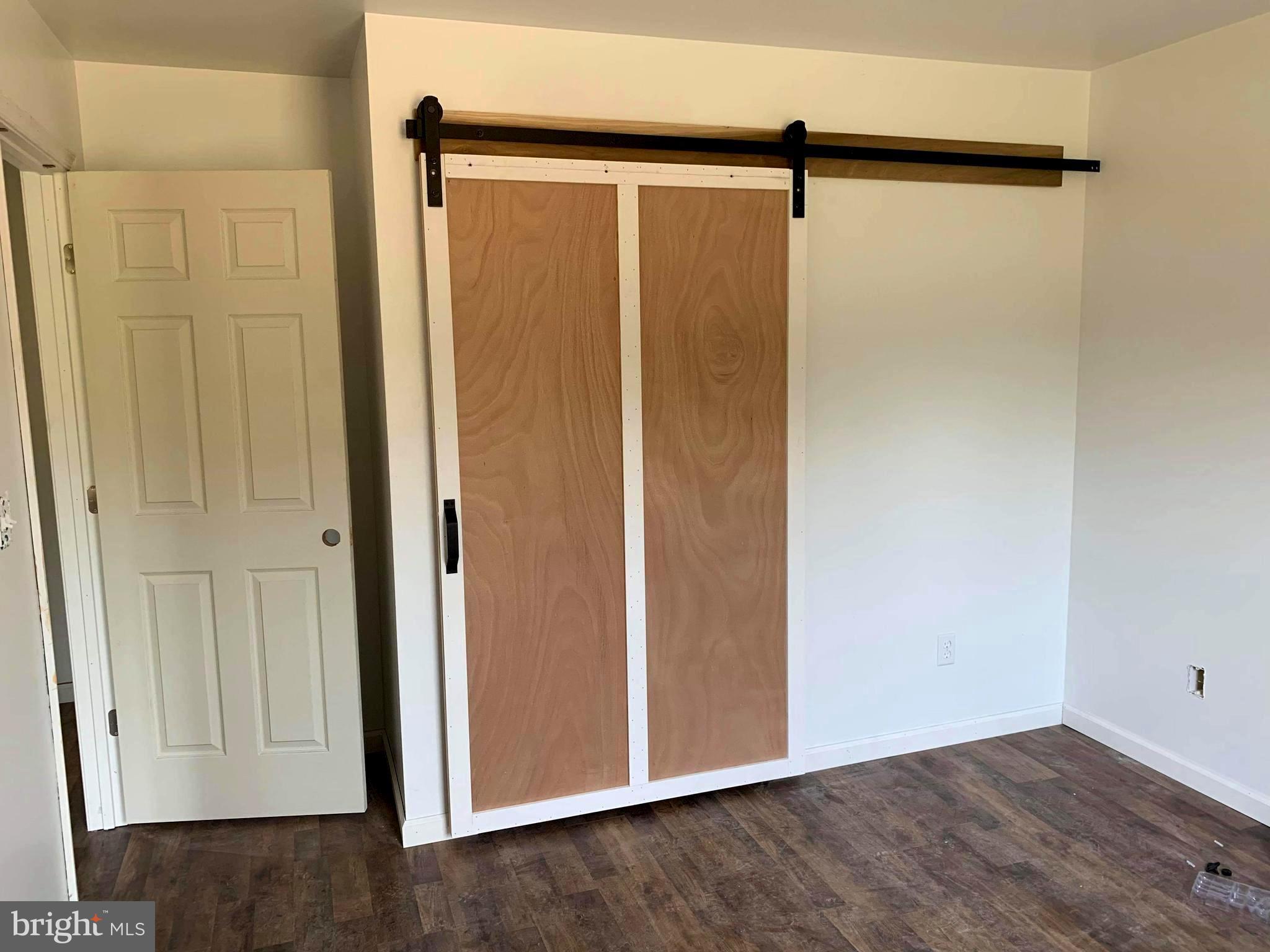 7164 Laurel Grove Road Preston, MD 21655 - Photo 15 of 28 Bedroom 2: Barn doors on closets
