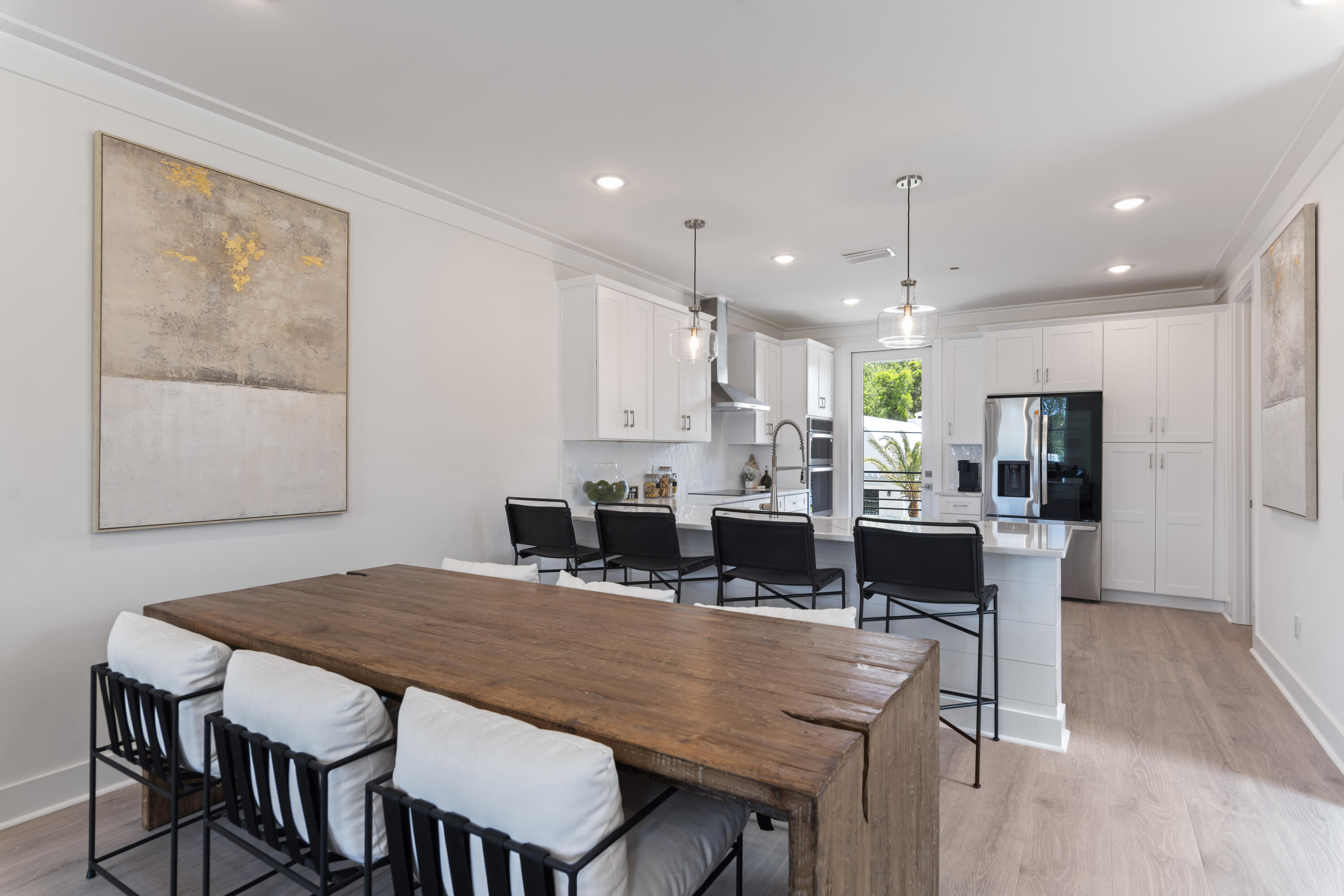 29 Blue Eden Loop, Unit LOT 24 Santa Rosa Beach, FL 32459 - Photo 11 of 32 a view of a dining room with furniture