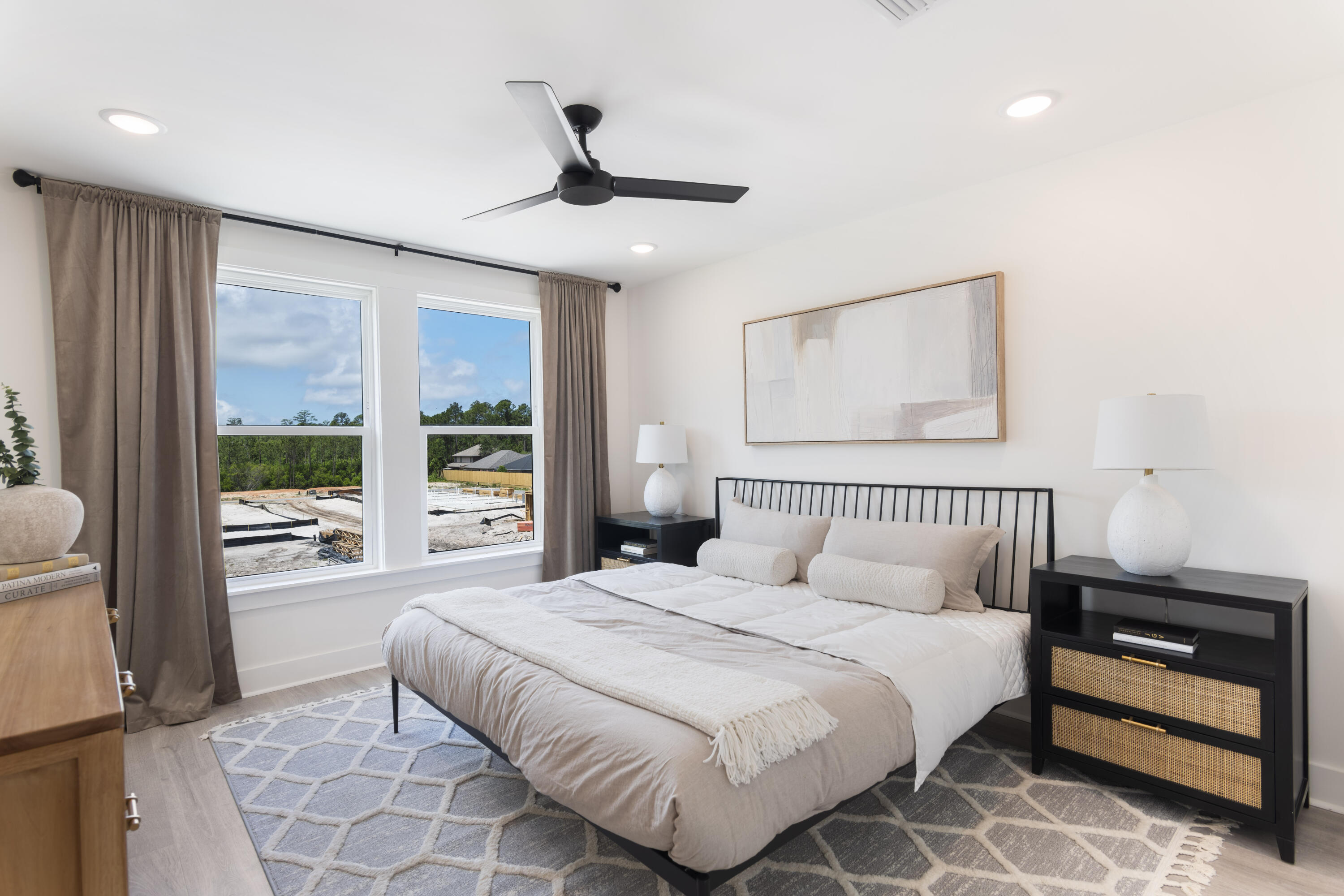 29 Blue Eden Loop, Unit LOT 24 Santa Rosa Beach, FL 32459 - Photo 16 of 32 a bedroom with a bed and a large window