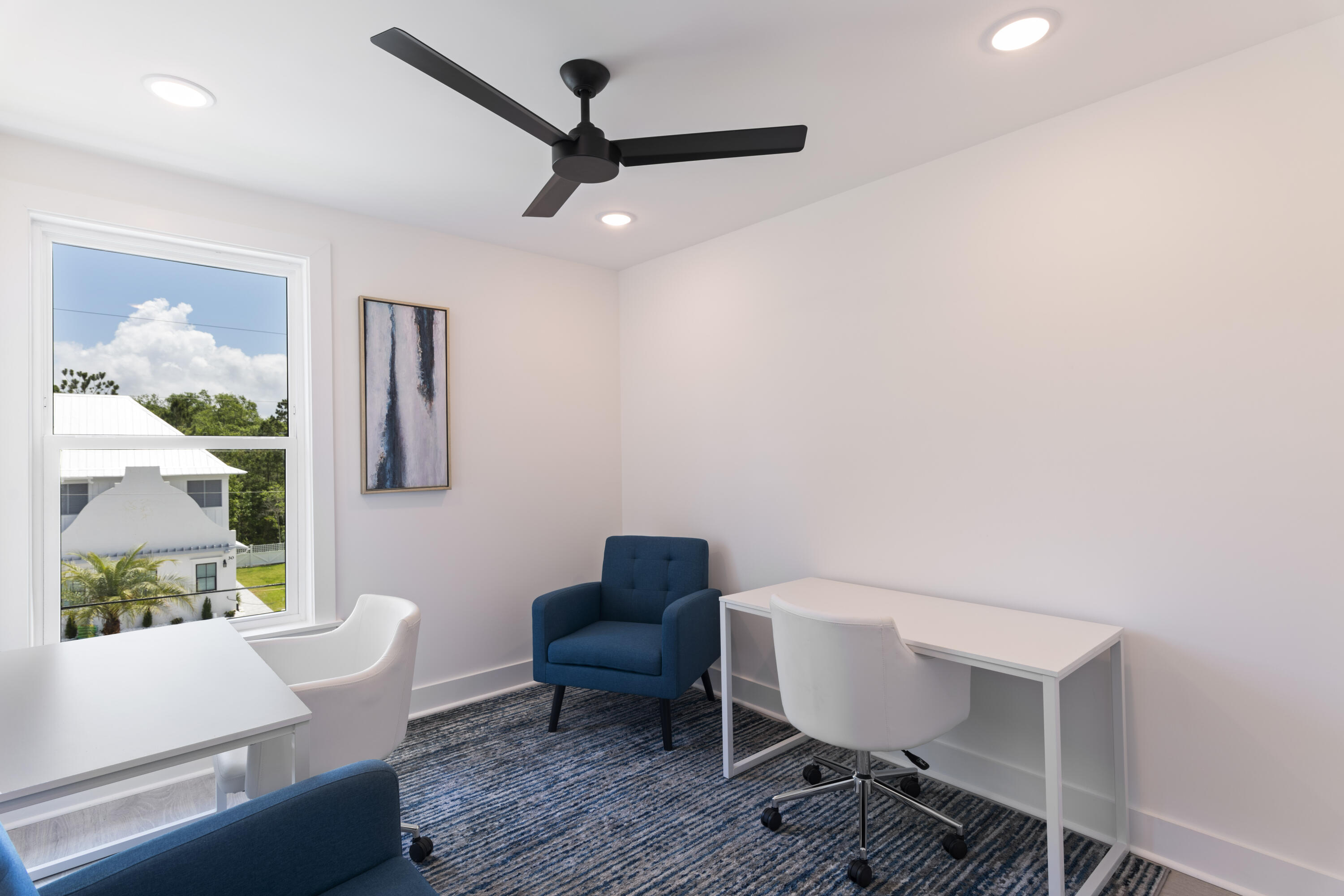 29 Blue Eden Loop, Unit LOT 24 Santa Rosa Beach, FL 32459 - Photo 23 of 32 a living room with furniture and a window