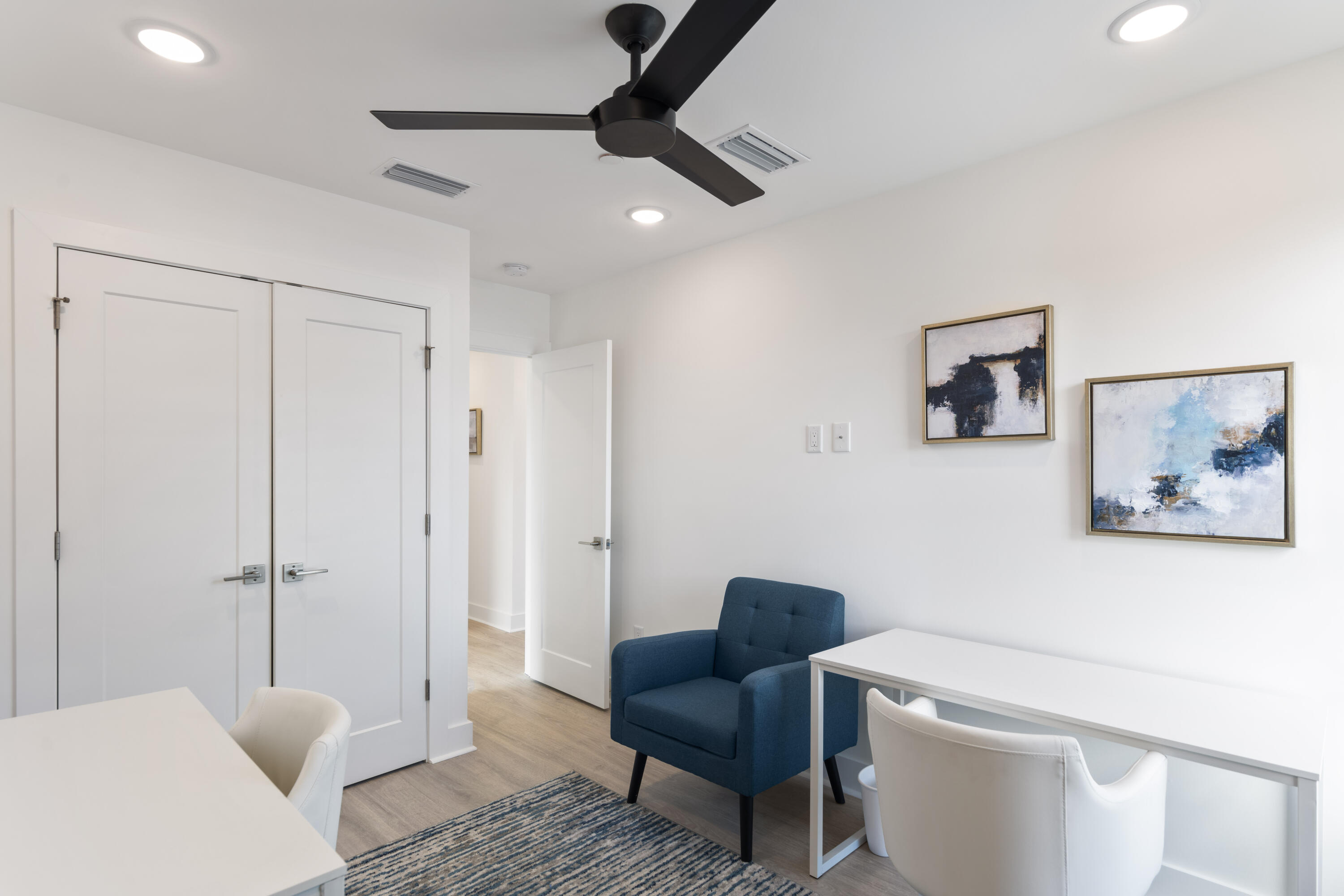 29 Blue Eden Loop, Unit LOT 24 Santa Rosa Beach, FL 32459 - Photo 24 of 32 a living room with furniture and a ceiling fan