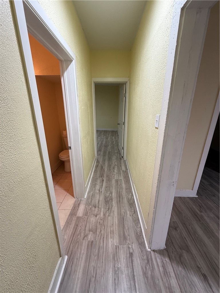 3001 Ruth Street Corpus Christi, TX 78405 - Photo 11 of 27 a view of a hallway and wooden floor
